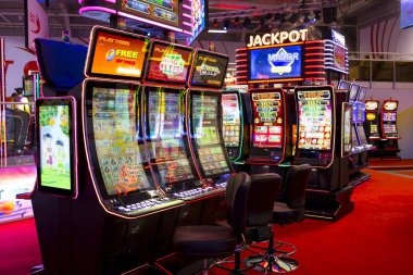 Live dealer studio with multiple camera angles broadcasting blackjack and roulette tables